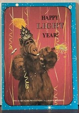 1987 Topps ALF Sticker 12 Happy Light Year NS1