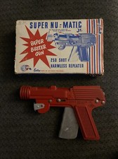 Vintage Super Nu Matic JR. Paper Buster gun Red in original package Repeater toy