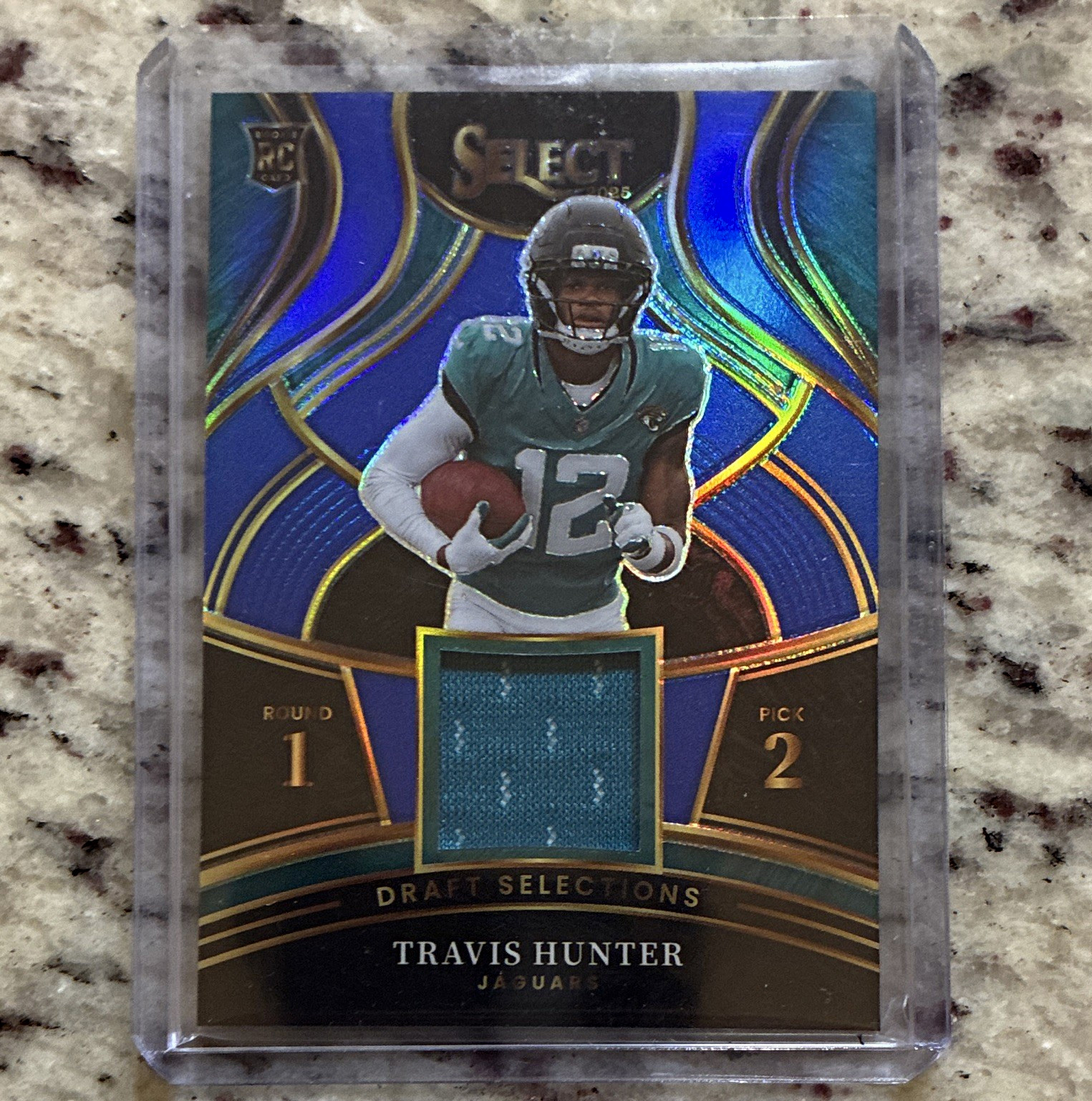 Panini Select 2025 Draft Selections Patch MEM Travis Hunter Blue Prizm RC