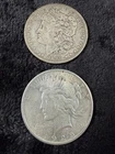 1886-O Morgan Dollar & 1925 Peace Dollar - Silver Coin Lot - 100 plus years old