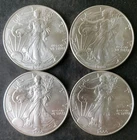 Lot of Four 2000 $1 American Silver Eagle Dollars