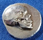 A Reckless Metals Skull 1/4 Ounce Silver Hand Pour .25 ozt