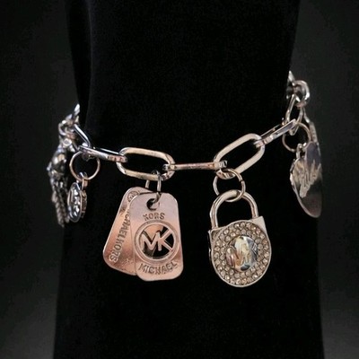 MK Michael Kors Signed Charm Bracelet Bangle Lock Tag Silver Tone