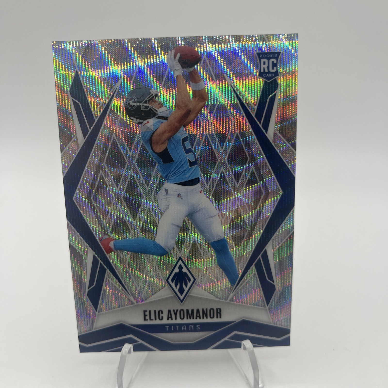 2025 Panini Phoenix Wave Elic Ayomanor 070/199 Tennessee Titans #167