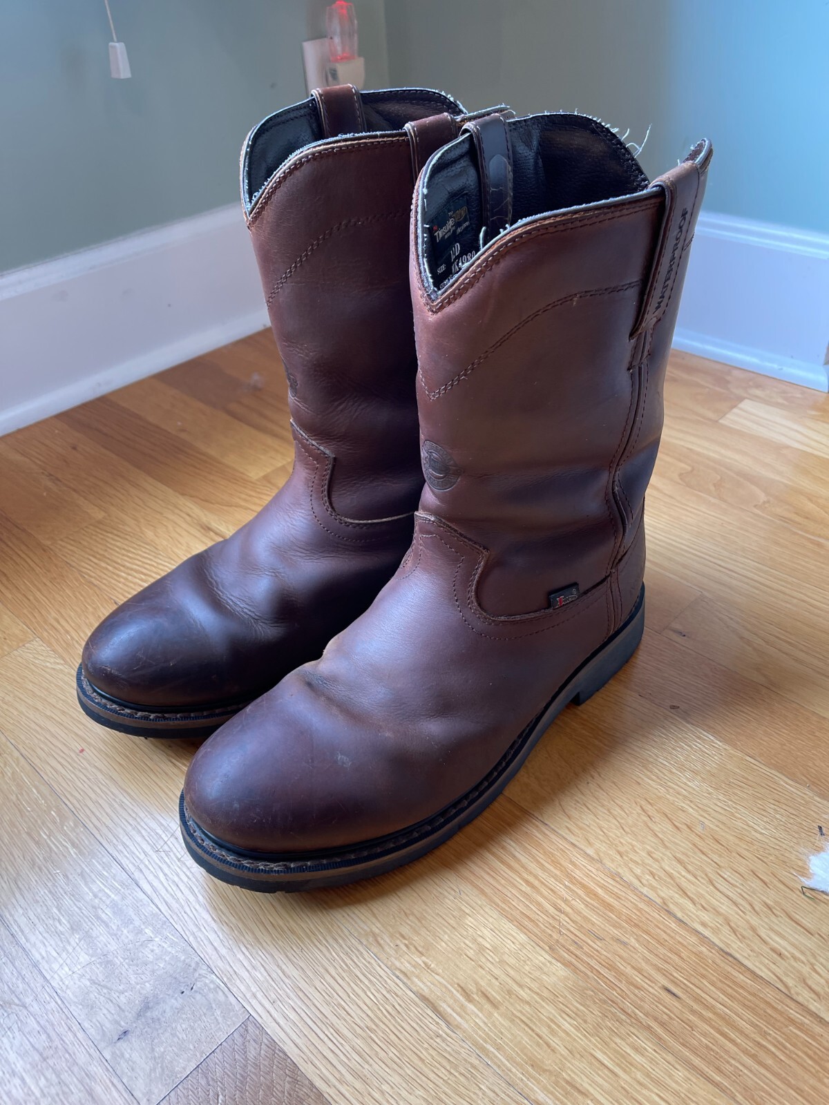 men's brown Justin boots size 12 insulated and waterproof in excellent
