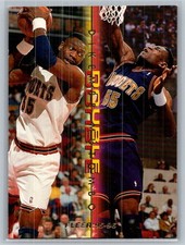 1995-96 Fleer Basketball Double Double #8 Dikembe Mutombo - VG - Denver Nuggets