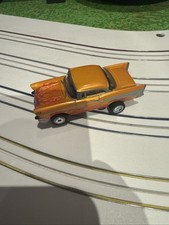 Auto World Thunderjet 1957 Chevrolet Bel Air Orange HO Slot Car