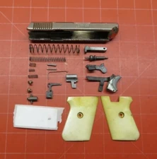 Jennings Model 25 25 acp repair parts Lot: Slide Grips Spring Pin Trigger - A