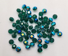 24pc Swarovski Crystal Emerald AB 5mm Lentil 5100 Beads; Iridescent Green