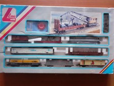 Lima grande scatola contenente un treno merci con carro gru usato pochissimo