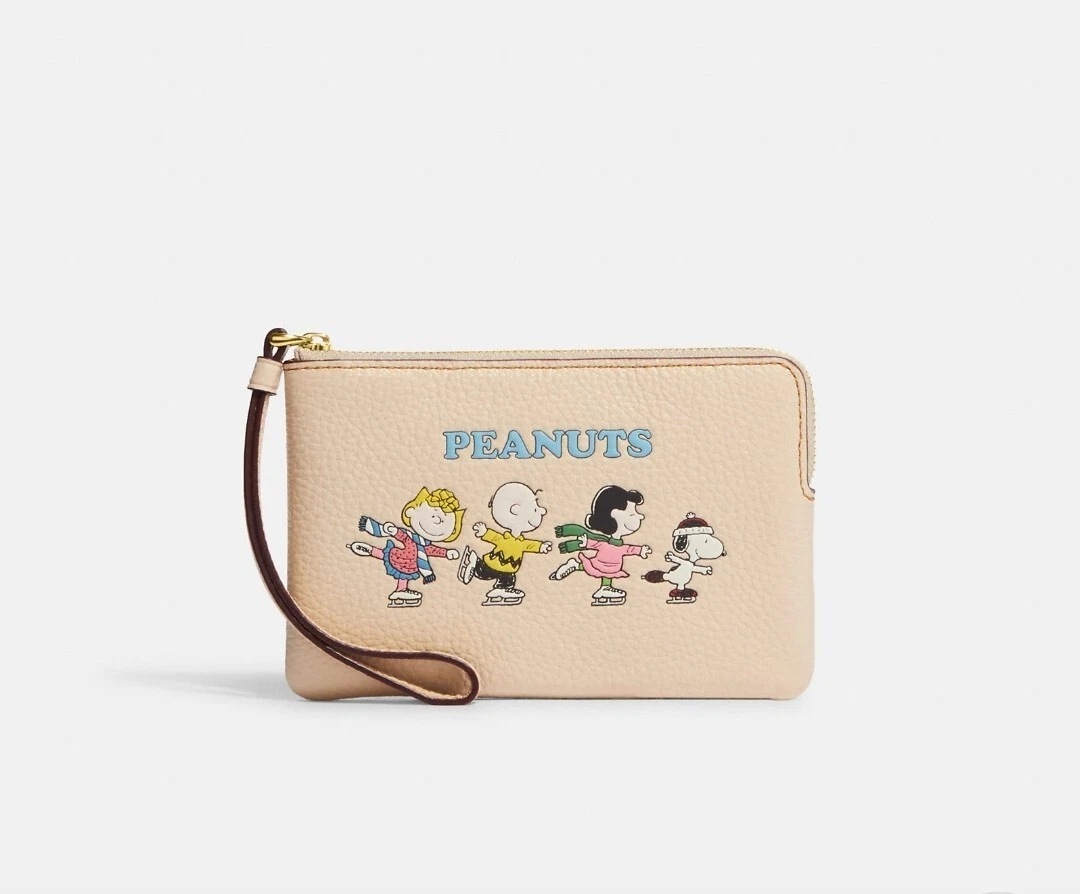 Coach CF213 X Polso con cerniera ad angolo Peanuts con motivo Snoopy and Friends nuovo con etichette