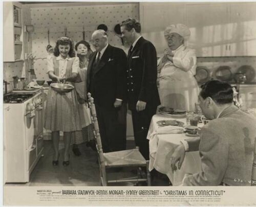 Christmas in Connecticut Barbara Stanwyck cooks in kitchen with guests 8x10