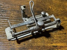 Scatola puzzle originale per macchina da cucire Singer (n. 11) - Piede/attacco Tucker