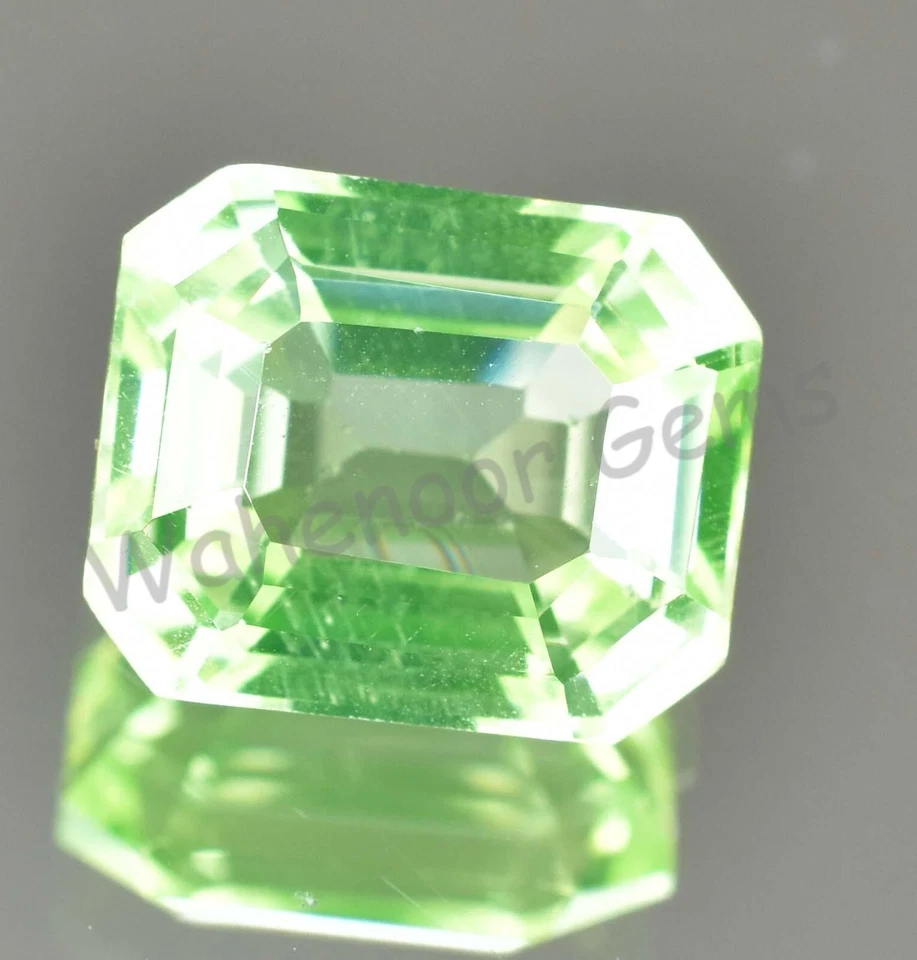 7.85 Ct Natural Green Peridot Emerald Shape VVS Pak Gemstone AGL Certified - Image 3 of 4