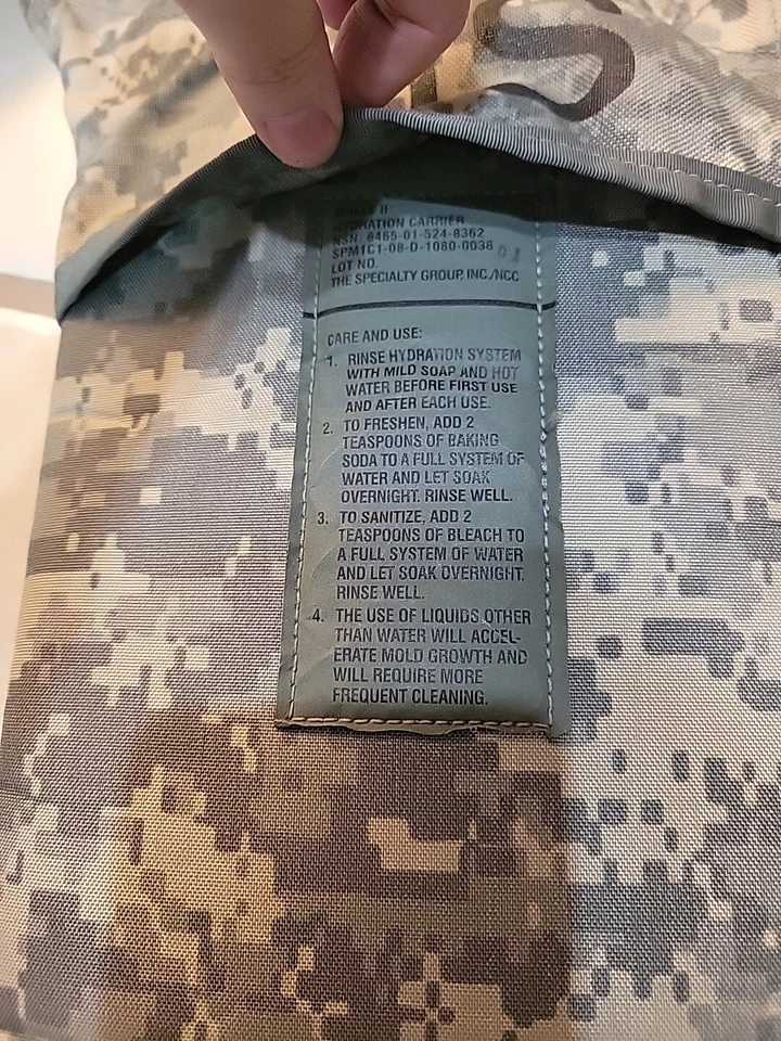 U.S. Military Issued MOLLE 2-Hydration Carrier￼ Complete With Bladder And Pocket - Image 4 of 4
