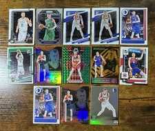 Kristaps Porzingis Sports Card Lot (13) (Base, Orange & Green Mosaic Prizm)