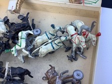 cast iron horses from 1800's set of 12very rare find, colors vary also.