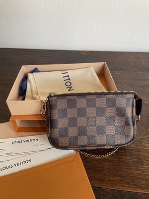 Louis Vuitton Mini Pochette Accessoires in Damier Ebene, very good condition