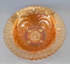 8 3/4 inch orange carnival glass bowl w a sanded front decor and a faceted back