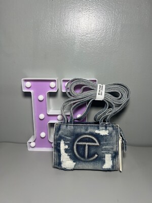 Small distressed denim blue Telfar