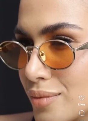 PRADA PR 65ZS ZVN02Z Pale Gold Orange Lenses Sunglasses Unisex