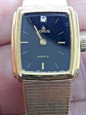 Vintage Lorus Quartz Watch Goldtone Black Face Tested Works