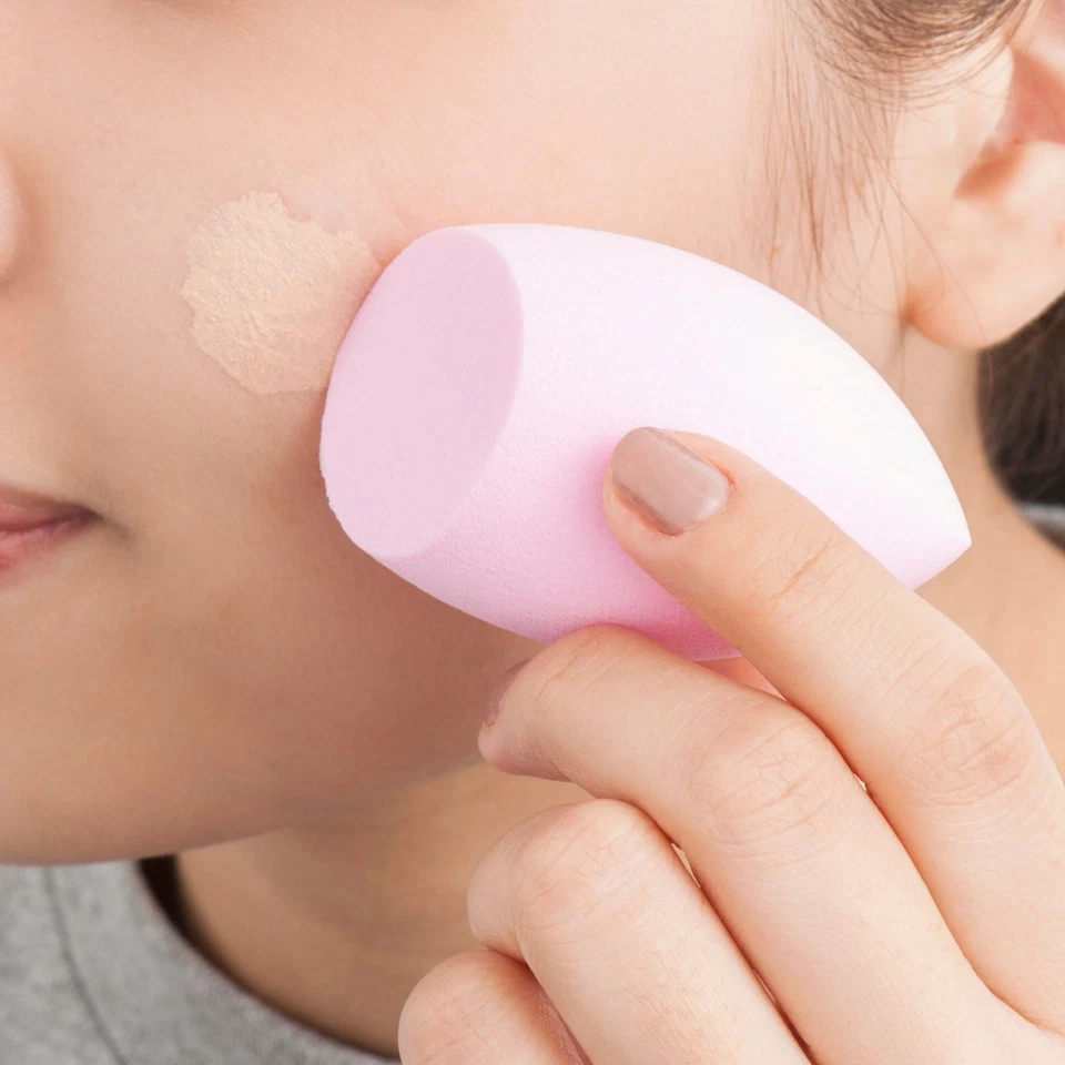 Esponja licuadora de maquillaje rosa claro caliente belleza dama diseño de huevo impecable Foto 3 de 4