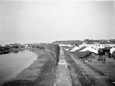 Wuhan China, city wall separating river and houses OLD PHOTO