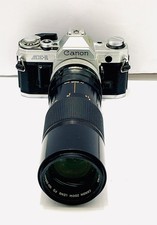 Canon AE-1 35mm Manual SLR Film Camera with 100-200 Cannon Zoom Lens Tested