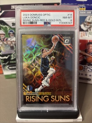 🔥2023 Donruss Optic Luka Doncic Rising Suns- Red and Gold Intl /99 PSA 8🔥