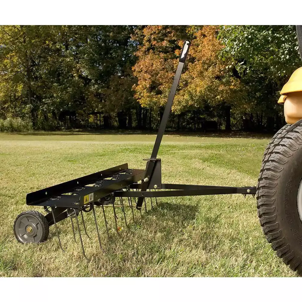 Riding lawn on sale mower dethatcher