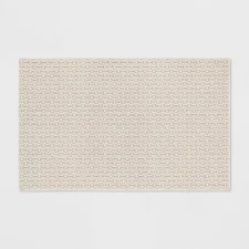 2'6"x3'10" Washable Solid Machine Tufted Accent Rug Tan - Threshold