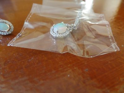Ethiopian Welo Opal Tanzanite Cambodian Zicon Platiunm over Sterling Silver