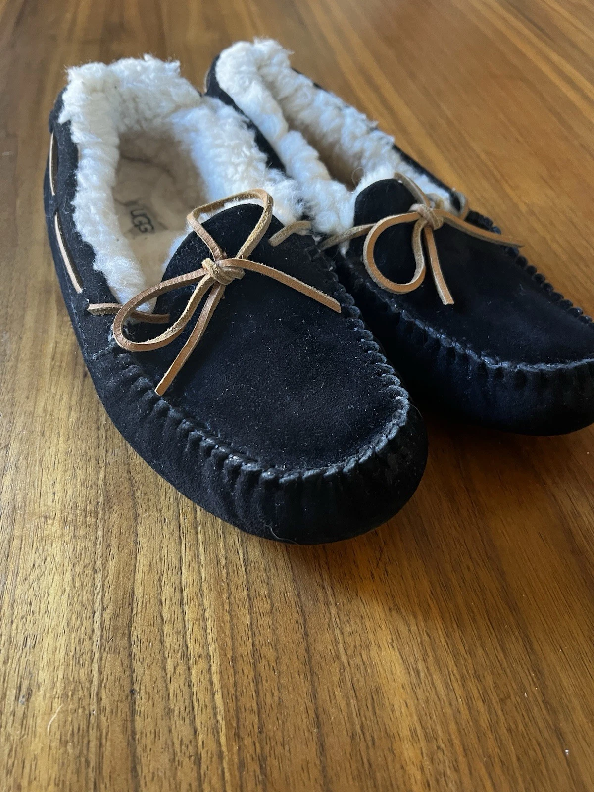UGG Dakota ciabatte mocassino da donna nere fodera in lana scamosciata 9 USA 40 EU UGGS