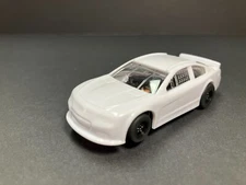 AUTO-WORLD ~ " '2015  CHEVY SS "  unpainted ~ BRAND NEW ~ for AFX, AURORA, TYCO