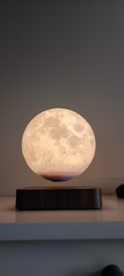 Magnetic levitating moon lamp