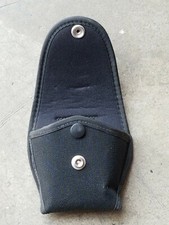 MILITARY POLICE "SIDEKICK" MOLDED NYLON HAND CUFF CASE.