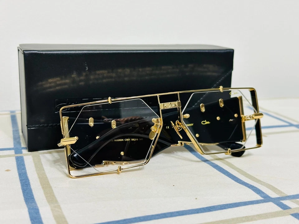 Gafas de sol Cazal con montura negra y dorada lentes transparentes para hombre y mujer Foto 2 de 4