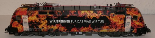 Roco 73228   TX Logistik 182 572-8 „WIR BRENNEN FÜR DAS WAS WIR TUN“, DC, Ep. VI | Zustand: Gebraucht