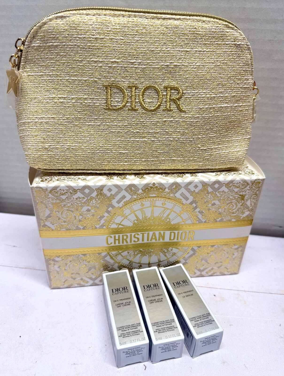 Pochette trousse à cosmétiques maquillage Christian Dior 2024 dorée avec 3 captures totales