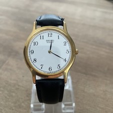 June 1988 Seiko Gold Tone Slim 34mm V700-8A10 Leather Strap Men’s Watch