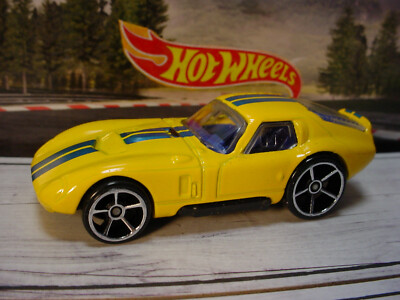 2009 Hot Wheels #184 Mystery Cars SHELBY COBRA DAYTONA COUPE  yellow;blue loose