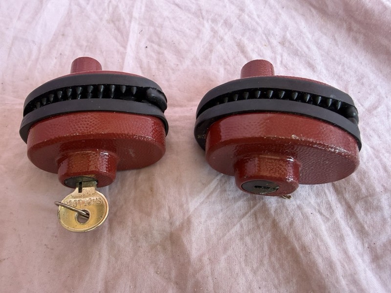 2 red, keyed trigger gun locks designed to prevent unauthorized use of a Gun