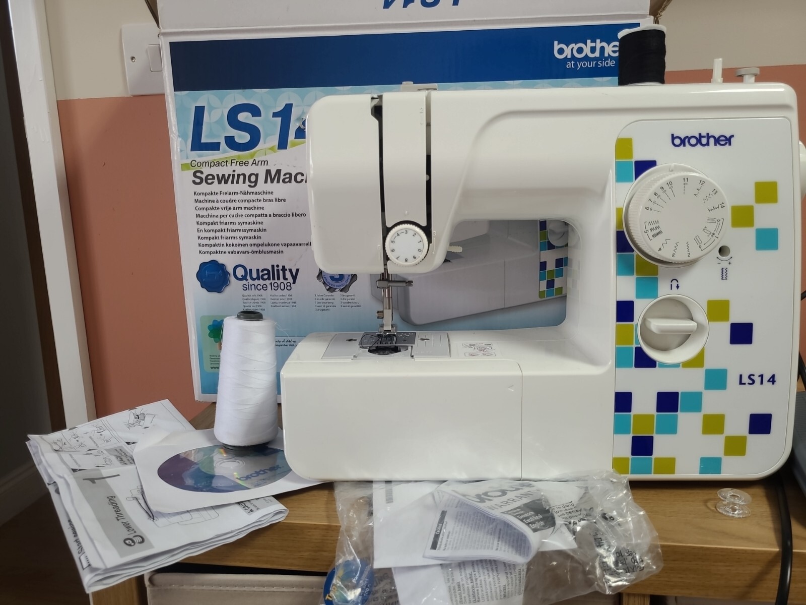 Brother LS14 Metal Chassis Sewing Machine White And Fabric