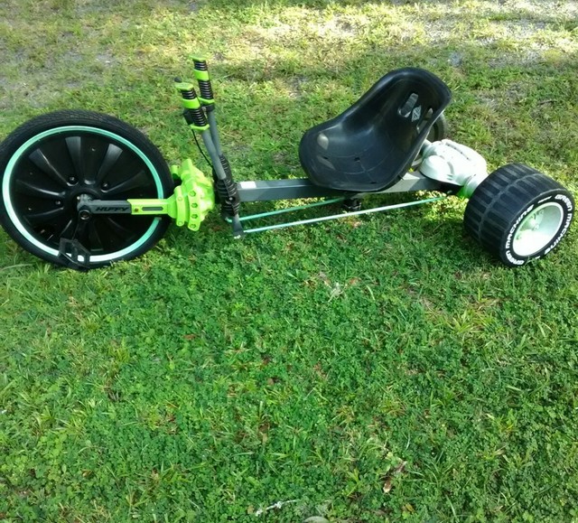 green big wheel tricycle