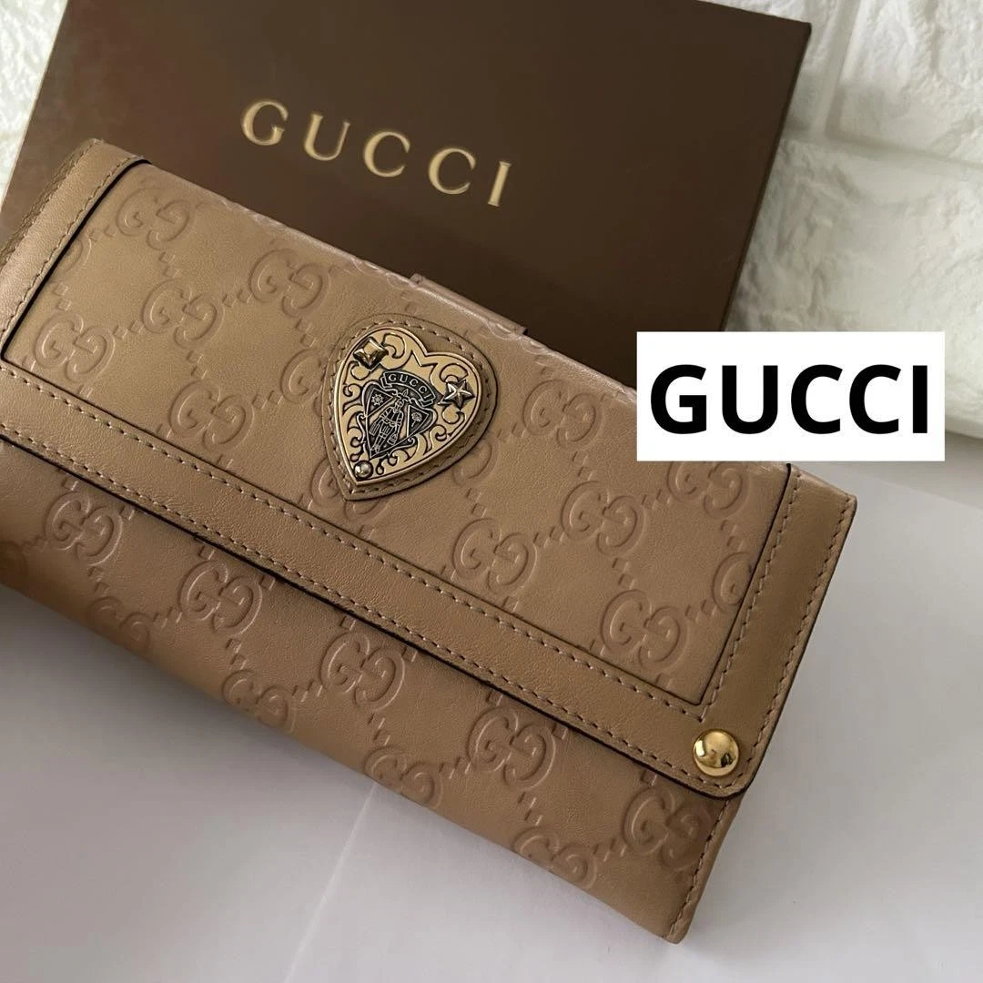 Portefeuille GUCCI GUCCI en cuir gaufré imbriqué beige