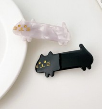 Black white cat hair barrettes
