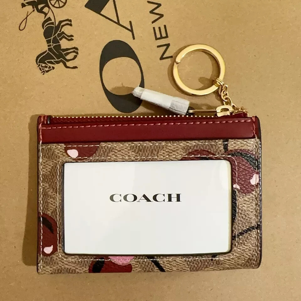 ♡レア♡ （新品未使用）✨ COACH✨ポーチ Coach Noa Pop Up Messenger with Cherry Print [Brass/Washed