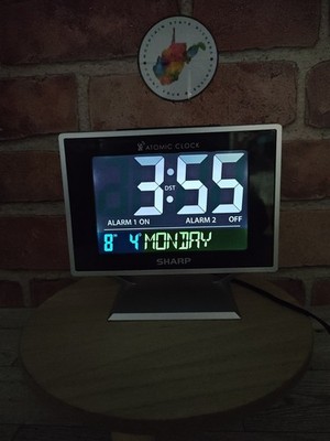 Sharp SPC 569 Atomic Desktop Dual Alarm Clock Multiple Time Zones Color Display 