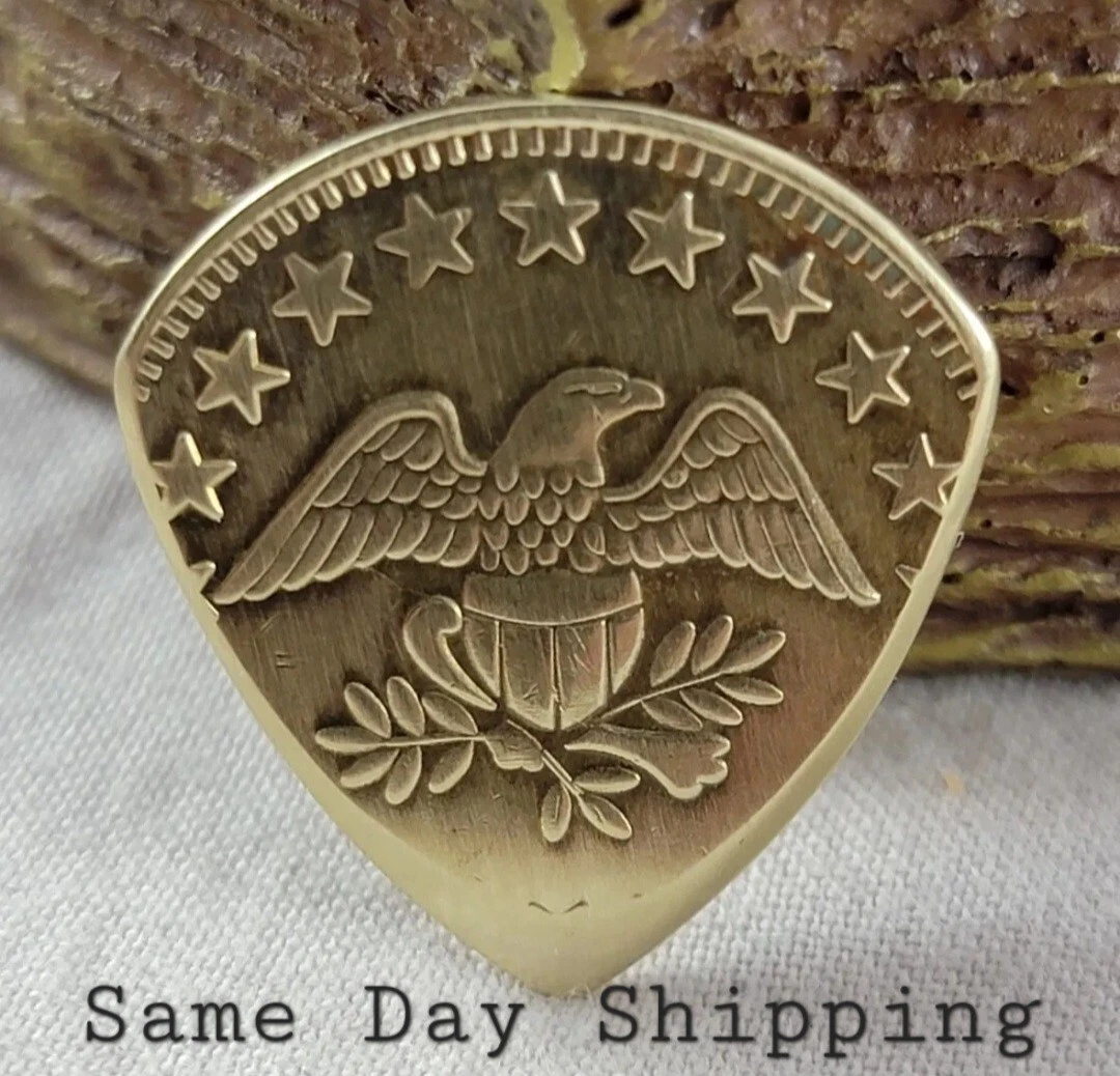 Coin Guitar Pick Made From A Solid Brass Coin Token. Coin Guitar